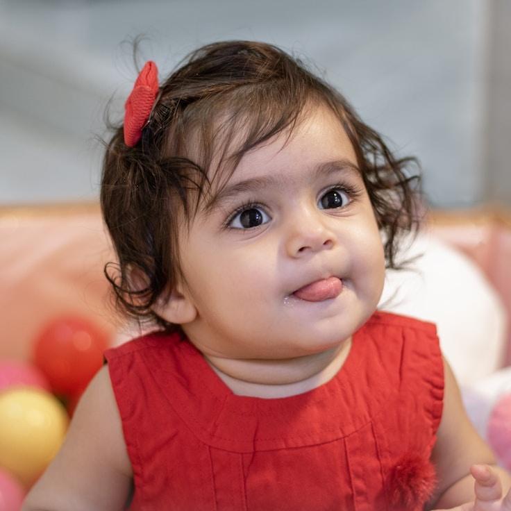 Asha Rao, Lead Design Curator at OpenStableClarityHub, reviewing corporate floral arrangements